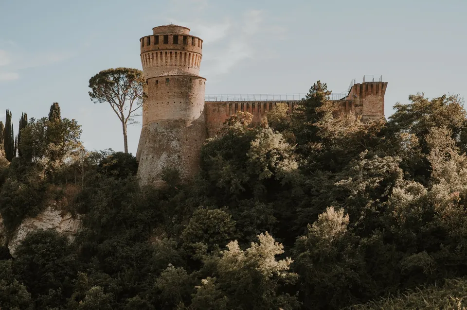 Brisighella's Rocca among the trees